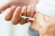 © Syda Productions - woman with syringe making insulin injection