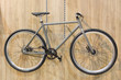 Bicycle hanged on wall