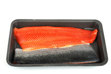 Wall Mural - fresh salmon fillet in black container tray