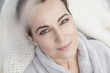 © Connect Images - Portrait of a mature woman, wearing bathrobe