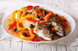 Latin American Food: escabeche of mackerel fish with vegetables 
