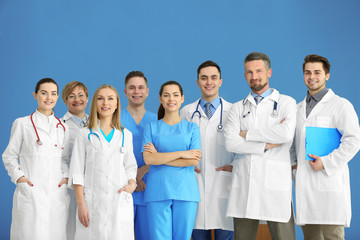 Canvas Print - A group of doctors and nurses standing in the hospital, indoors