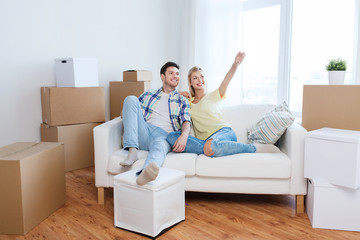 Wall Mural - couple with boxes moving to new home and dreaming