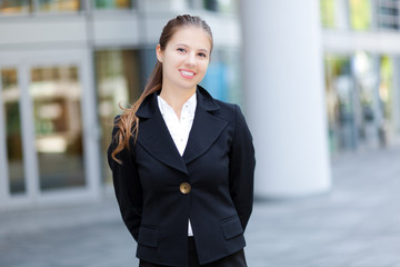 Sticker - Smiling female manager in urban setting