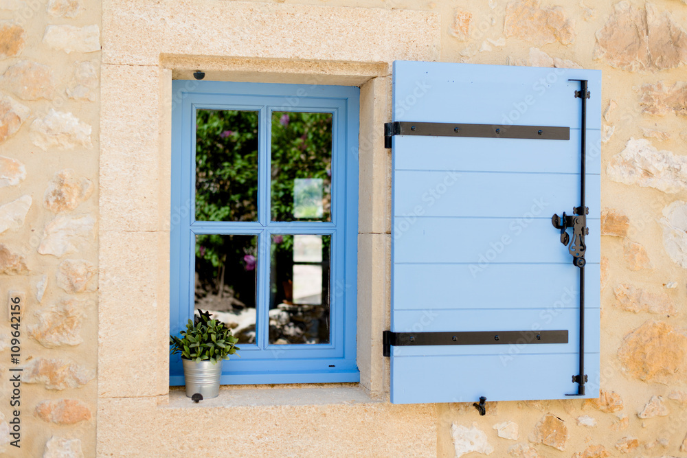 Obraz na płótnie blue old window in traditional french provence architecture w salonie