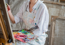 Painter In Her Studio