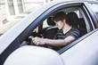 © Louis-Paul Photo - Teenage boy and new driver behind wheel of his car