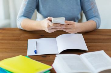 Sticker - close up of student with smartphone and notebook