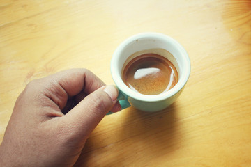 Wall Mural - Selfie of hand with espresso coffee