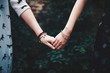 © RooM The Agency - Close-up of two young women holding hands
