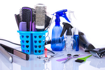 Wall Mural - Professional hairdressing equipment - hair dryer, a water bottle, comb, scissors, pins, clips. Tools for hairdresser, beauty salon.