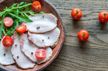 Canvas Print - Baked meat with fresh rocket salad and cherry tomatoes