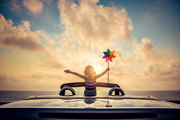 Poster - Silhouette of young woman relaxing on the beach