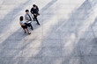 © DragonImages - Business people going to work in the morning, view from above