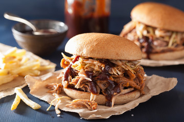 homemade pulled pork burger with coleslaw and bbq sauce