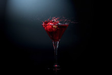 Strawberry Splashing In Martini Glass