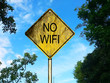 No Wifi Yellow Yellow Road Sign with a countryside background