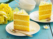 A piece of lemon sponge cake on a plate.