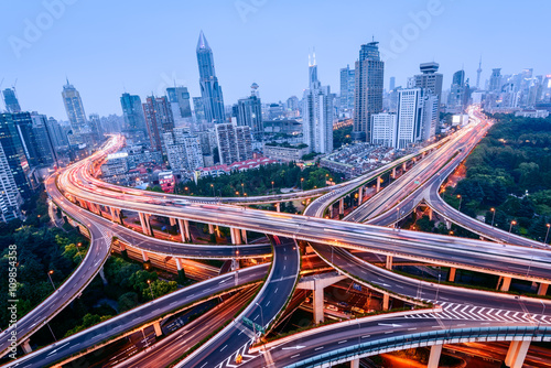 Aerial view of a highway overpass at night in Shanghai - China. Poster