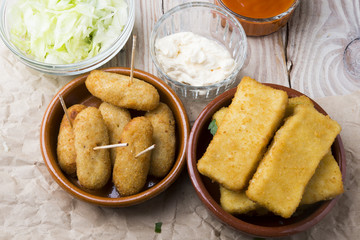 Wall Mural - croquettes balls and different kind of sauces on a plate on a cl