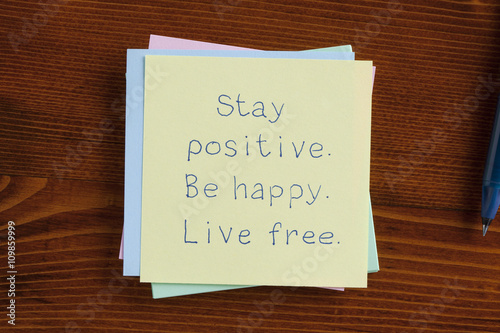 Stay positive Be happy Live free handwritten on note Poster