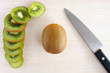 Kiwi fruit slice on wooden background