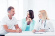© Syda Productions - doctor with patients in cabinet