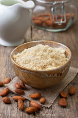 Poster - almond flour in a ceramic bowl