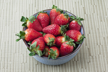 Wall Mural - bowl full of strawberries.