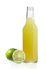 Wall Mural - close-up image of lime juice and lemons.