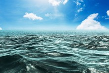 Composite Image Of Blue Rough Ocean