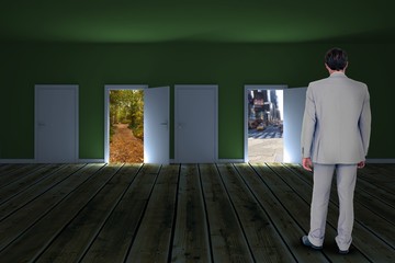 Sticker - Composite image of rear view of businessman walking on white bac