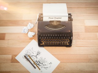 Poster - Final chapter against typewriter and paper on table in office