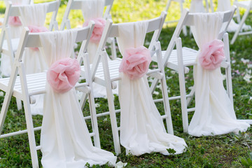 white wedding chairs for the ceremony