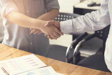 businessman handshaking for business acquisiton concept