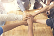 © 88studio - united hands for cooperation and teamwork concept