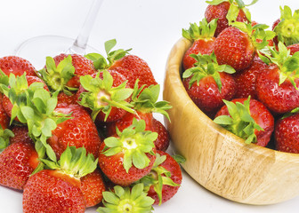 Wall Mural - fresh whole strawberries in wooden bowl