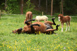 © Zuzana Tillerova - Suprised foal looking at roll around mare