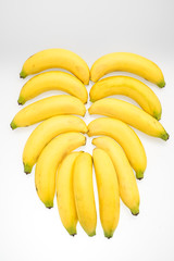 Wall Mural - face of banana with white background