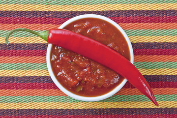 Wall Mural - spicy salsa dip with red chili pepper