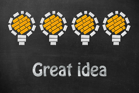 Ideas Light Bulb Concept Work on Blackboard and motivational text