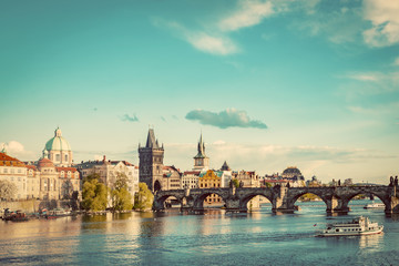 Wall Mural - Prague, Czech Republic skyline with historic Charles Bridge and Vltava river. Vintage