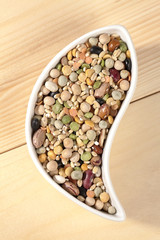 Wall Mural - various beans in container.