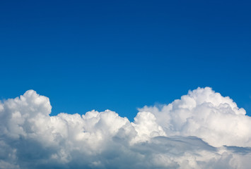 Beautiful nature background of blue sky and white clouds