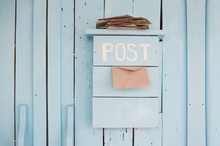 Mailbox With Letters In Vintage Style On Wooden Blue Background