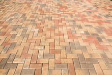 Red Brick Paving Stones On A Sidewalk