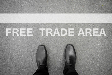 Wall Mural - Black shoes standing at free trade area
