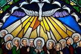 Fototapeta Kwiaty - stained glass window depicting Pentecost