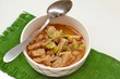 © luciepeclova - Goulash with oyster mushroom in the bowl on the green gunny cloth