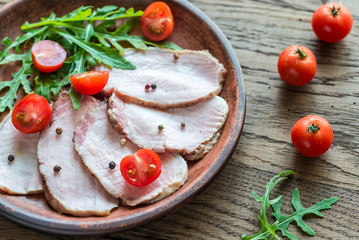 Canvas Print - Baked meat with fresh rocket salad and cherry tomatoes